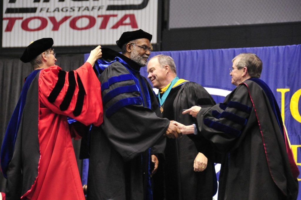 Rufus Glasper receiving degree